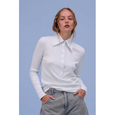Nathalie Vleeschouwer polo bleu